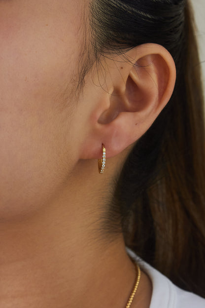 Half Pavé Flat Oval Huggie. 18K Saudi Gold Fine Jewelry Jewellery in the Philippines. 18 karat fine jewelry solid gold jewelry.Classy Elegant Huggie Minimal Dainty. High quality. Earrings