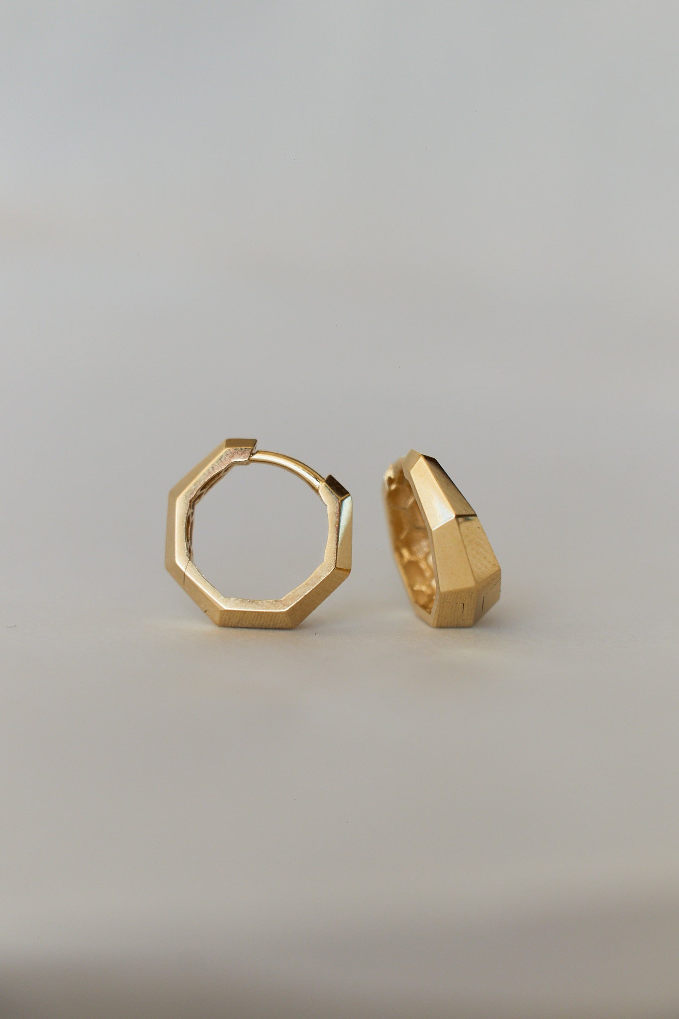 18K Saudi Gold Fine Jewelry Jewellery in the Philippines. 18 karat fine jewelry solid gold jewelry. Heptagon Huggie. Classy Elegant Huggie Minimal Dainty. High quality. Earrings